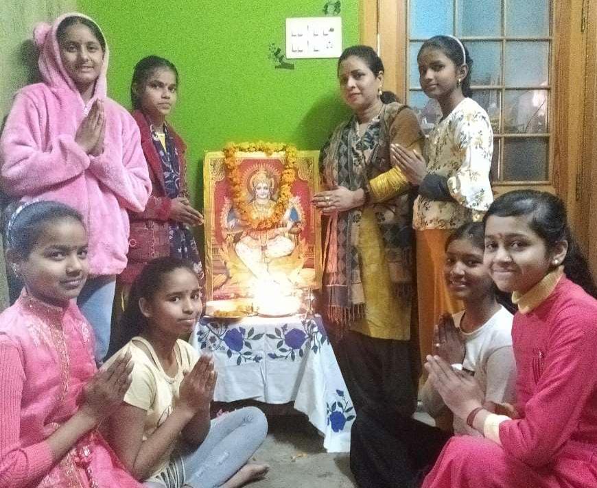 Saraswati, the goddess of knowledge, was worshiped wearing yellow clothes.