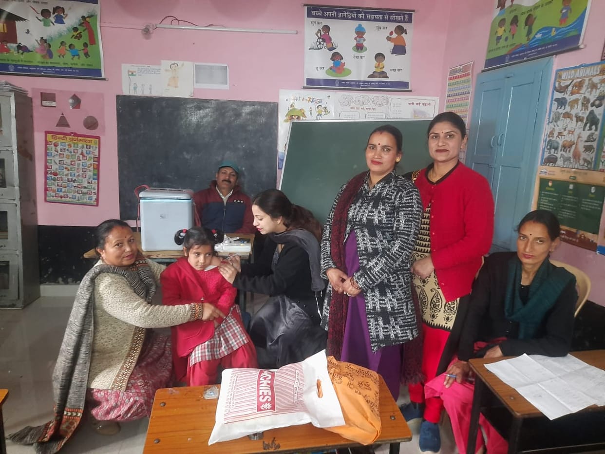 Vaccination of students in Bharia school