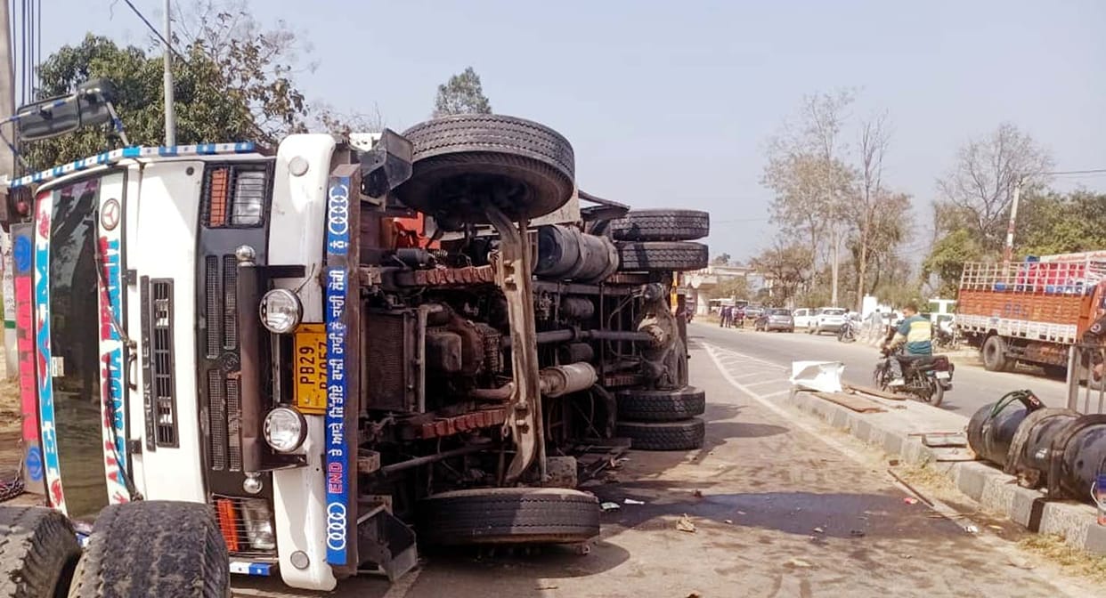 Uncontrolled truck overturns on highway, driver injured