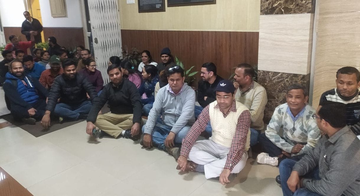 Accounts workers sitting on strike in protest against the transfer of Accounts Officer