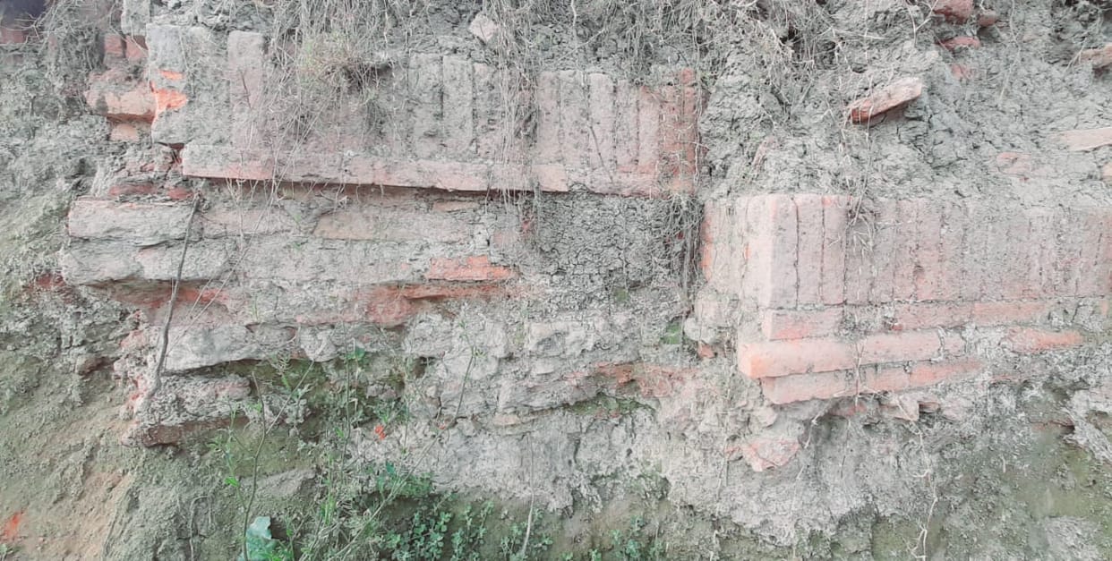 Ancient brick wall found during excavation at Dashashwamedh Tirtha