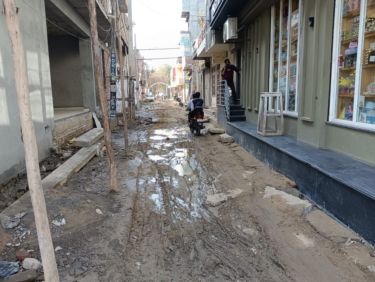 One and a half thousand students are bearing the brunt of the chaos, reaching school through mud.