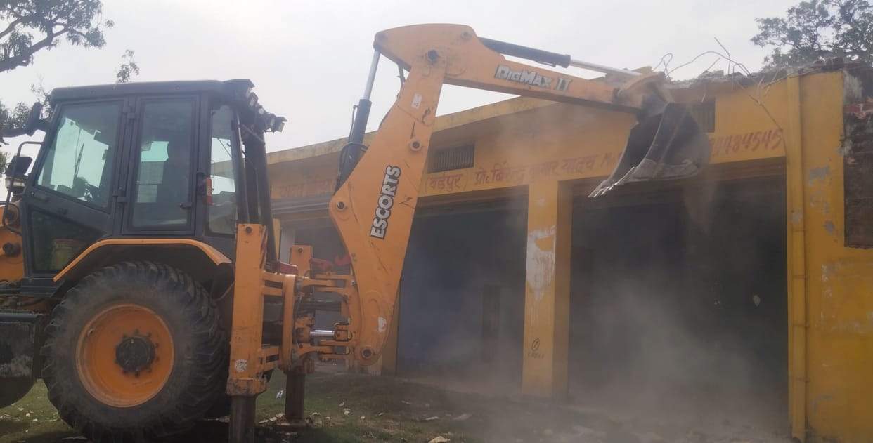 Bulldozer runs on house built on government land