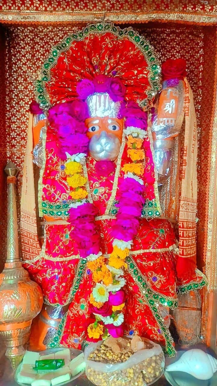 Devotees adorned Hanuman Baba by offering him a chola.