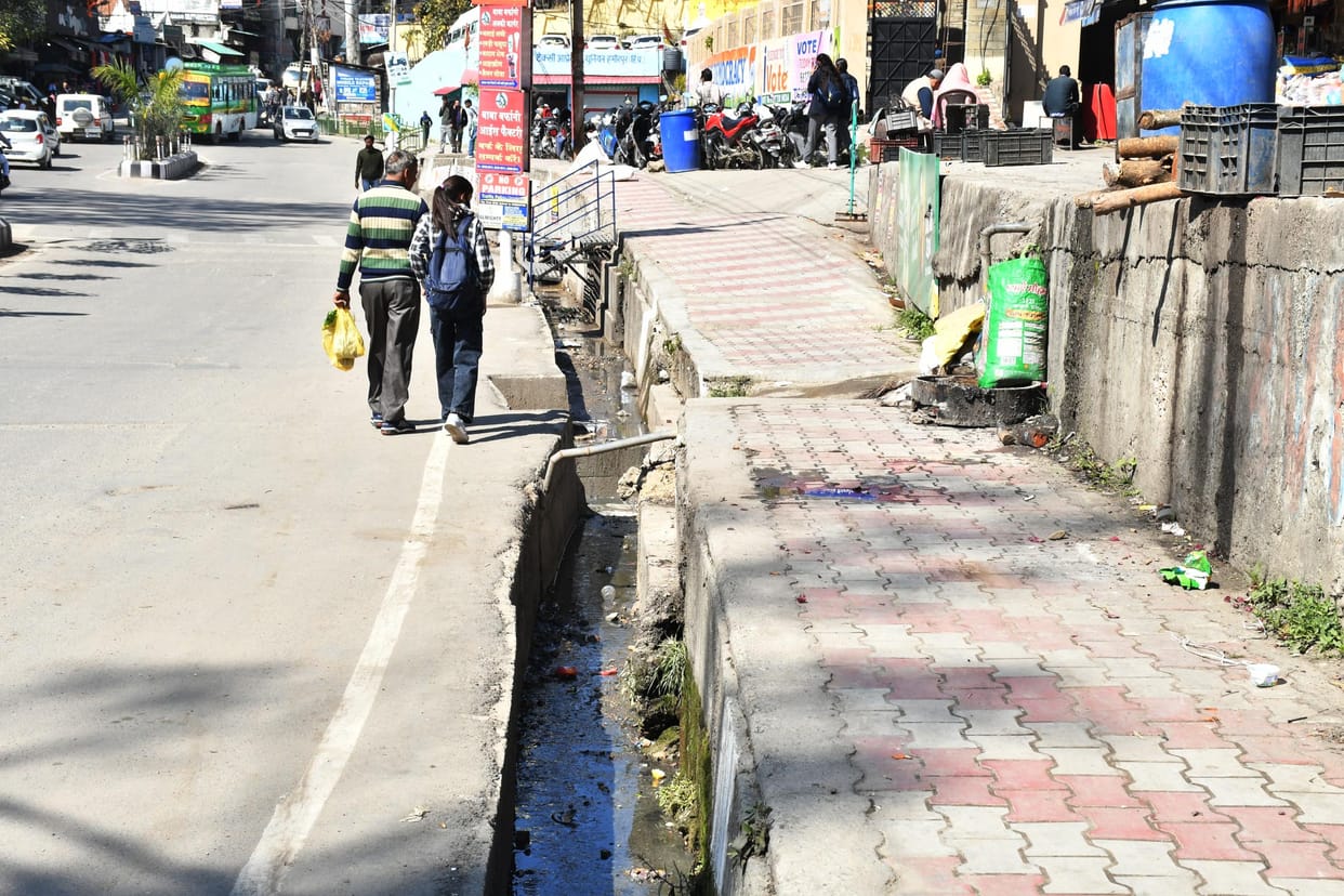 The road to reach the shopping complex is difficult