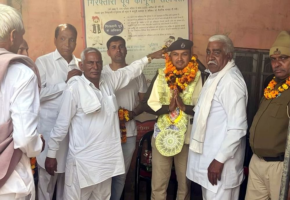 Villagers honored SI Sandeep Kumar and his team