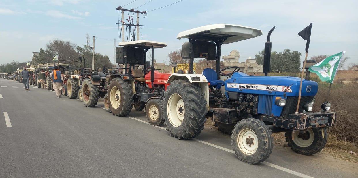 Farmers marched by putting black flags on tractors