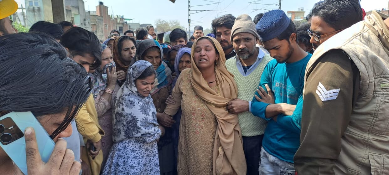 Woman commits suicide by jumping in front of train