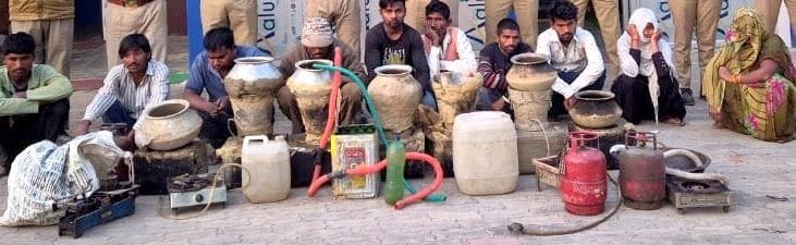 Kilns of illegal liquor were burning in M's garden.