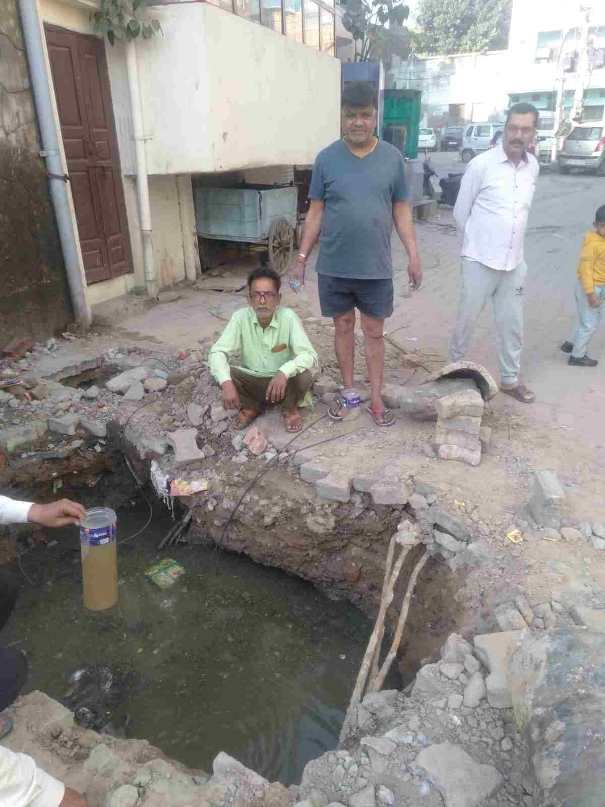Sewer line damaged while repairing broken drinking water line while installing a pole, dirty water coming into houses