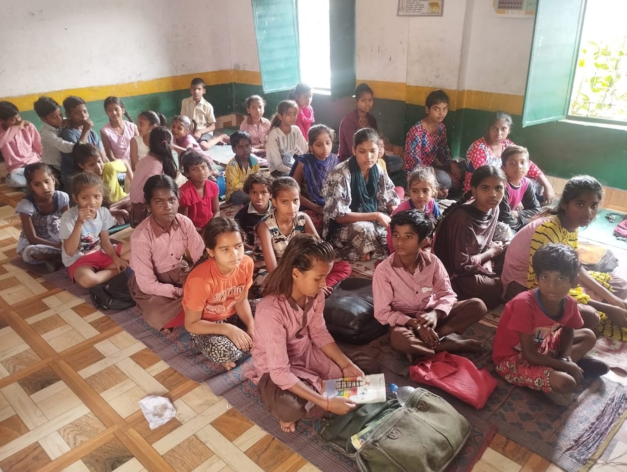 Poor condition of schools...children studying sitting on sackcloth