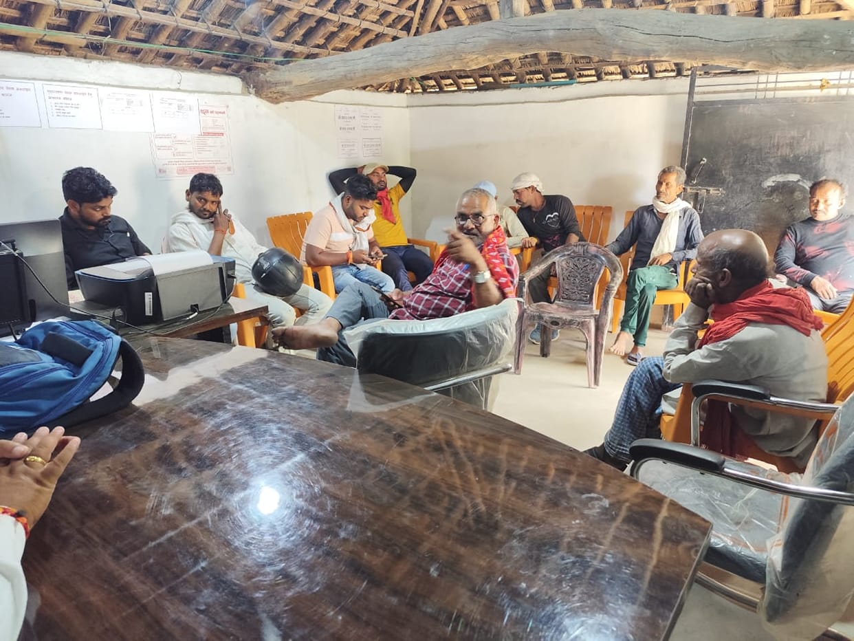 Road dug for pipeline, people surrounded contractor and laborers