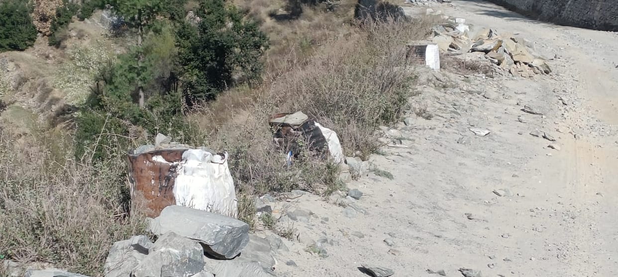 Tar drums filled with stones were installed in place of crash barriers in Bharmour area.