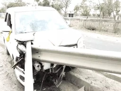 Car collides with railing, no one injured