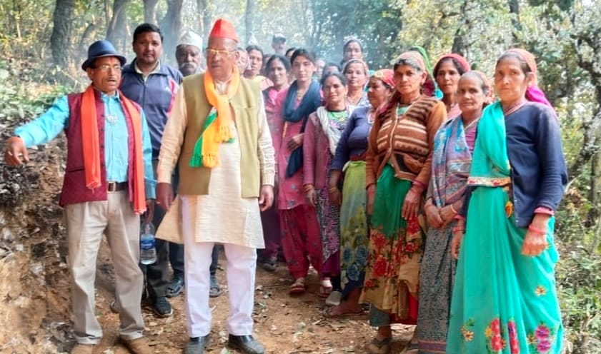 MLA himself came to take care of the women busy in building the road.