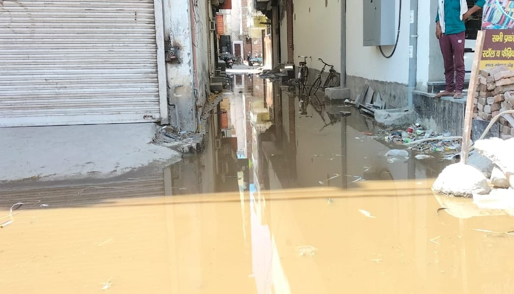 Goods warehouse road filled with contaminated sewer water