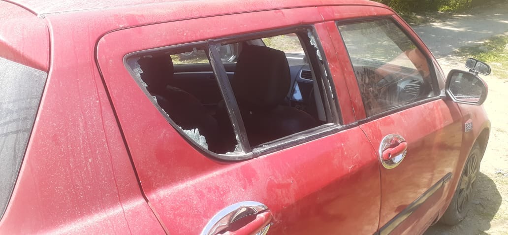 Stolen music system by breaking the glass of car parked outside the house