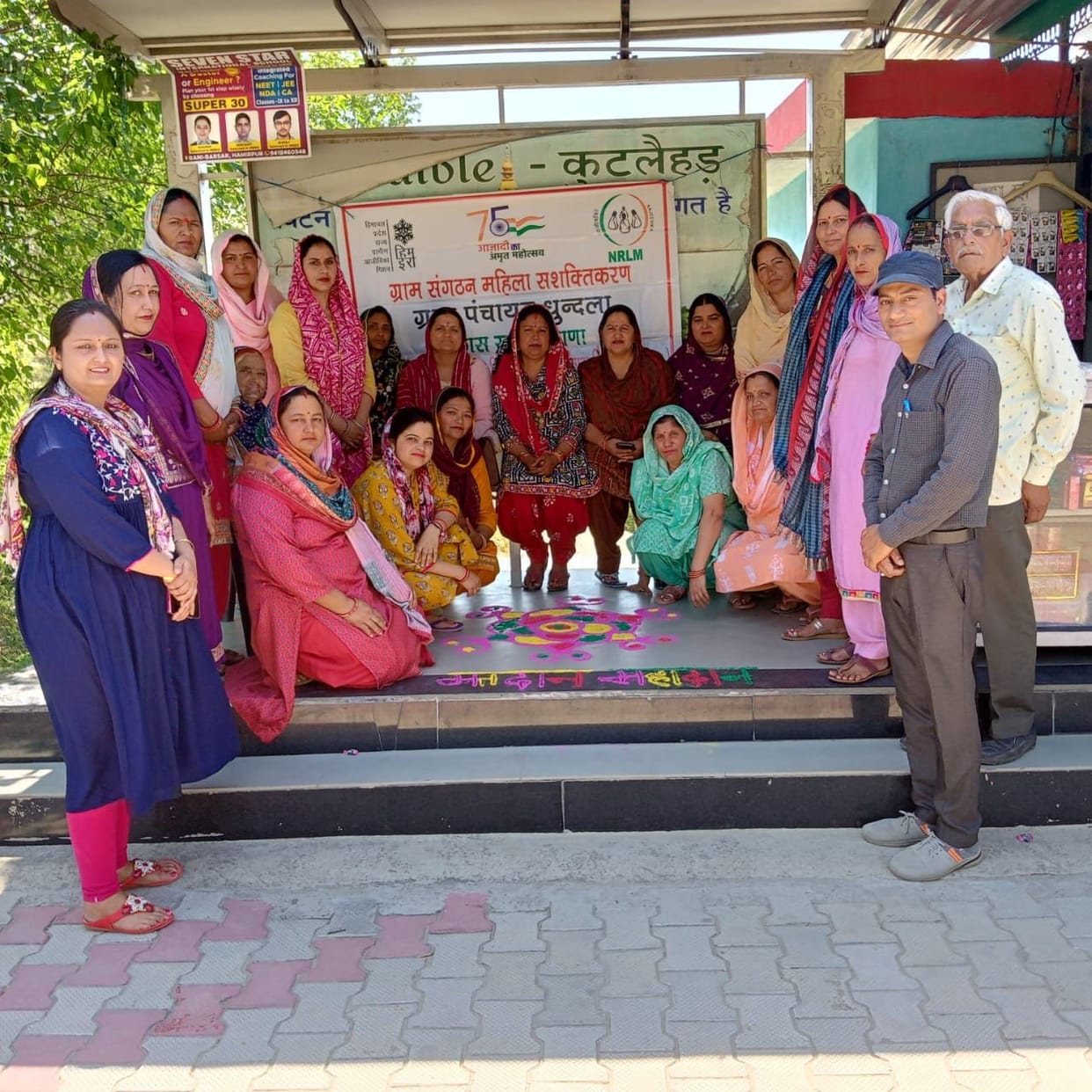 Women made voters aware with rangoli
