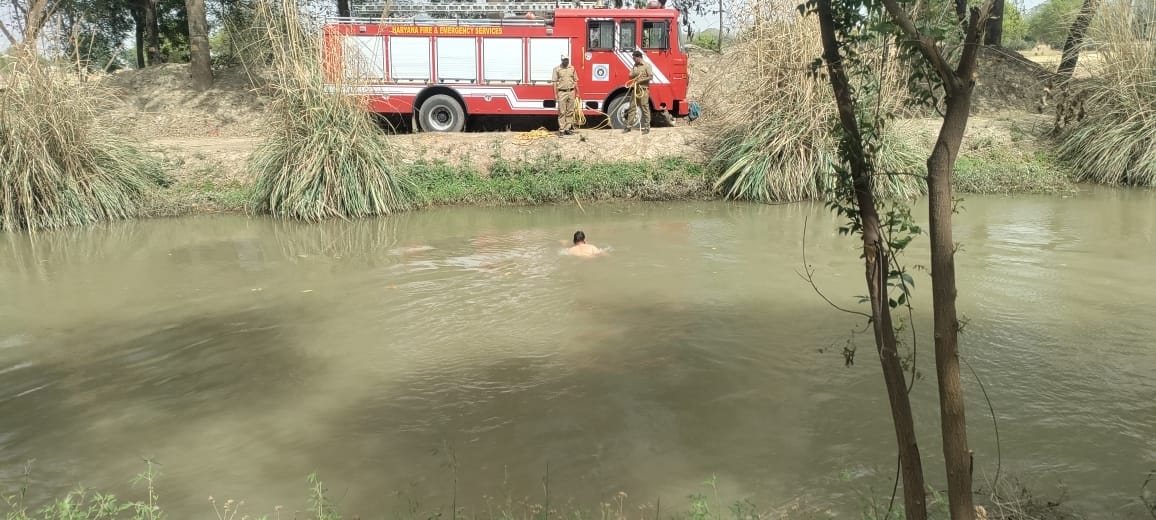 Woman jumps into canal after writing son's mobile number, missing