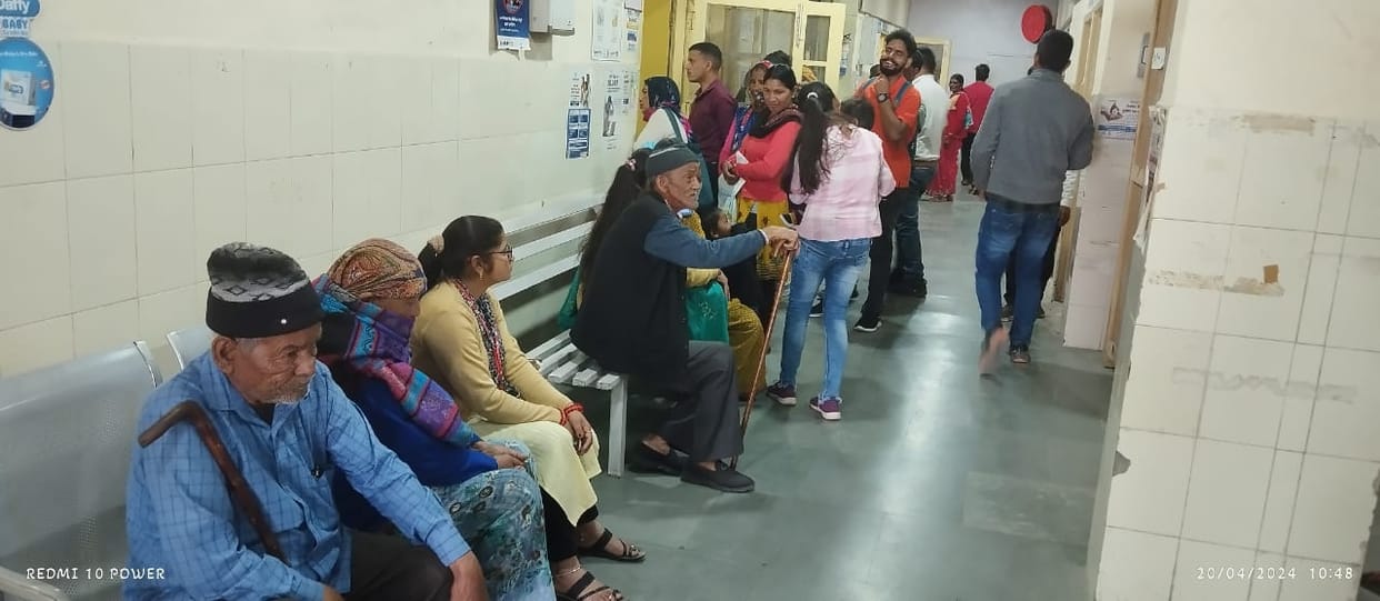 A crowd of patients gathered outside the physician's room.