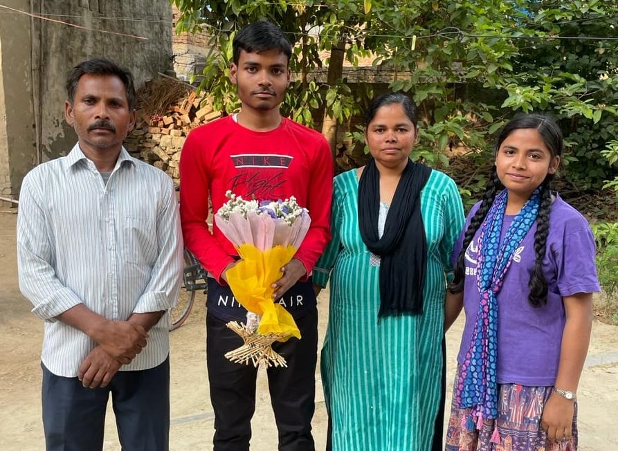 Timothy in high school, Dhruv district topper in Intermediate