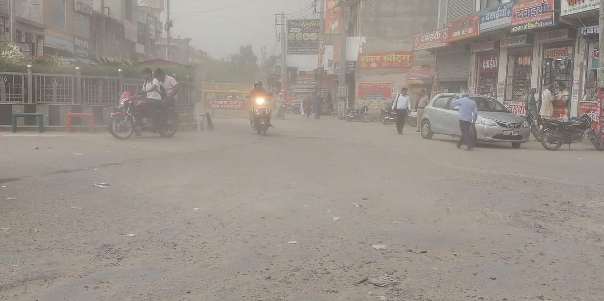 Clouds covered the sky, dusty wind blew