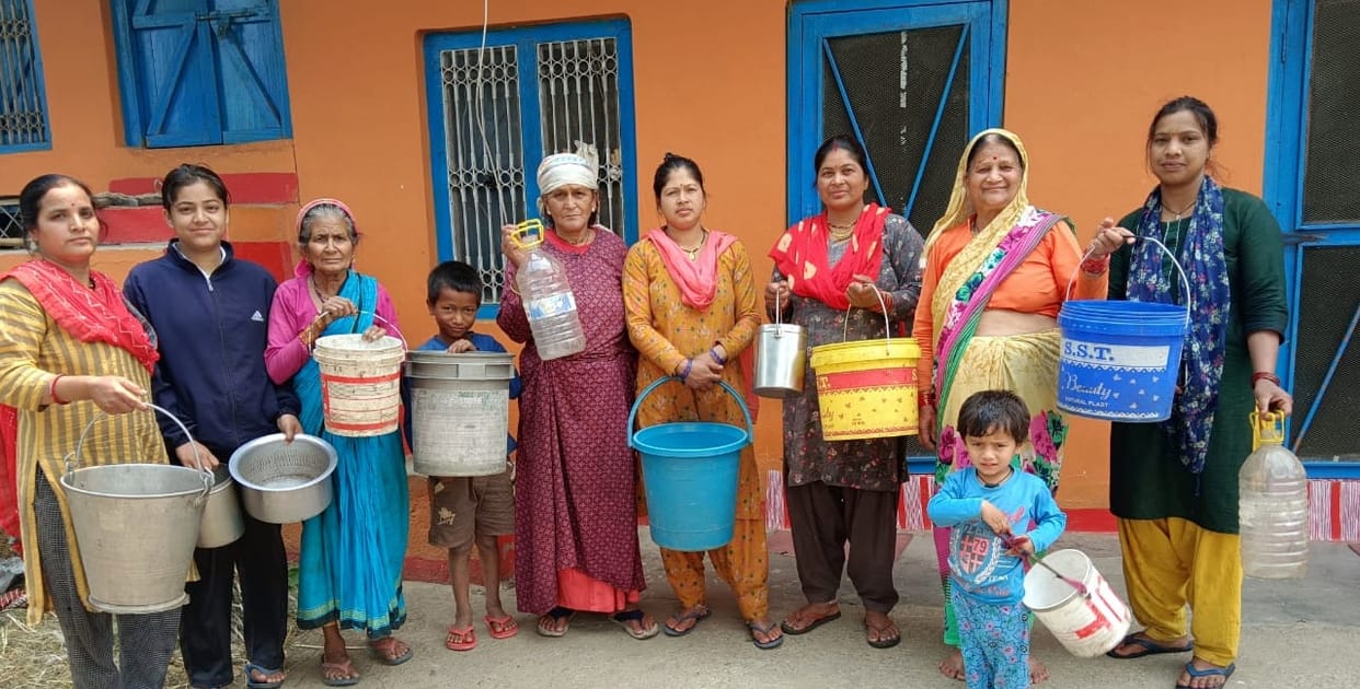Women of Digoti village demonstrated with empty utensils
