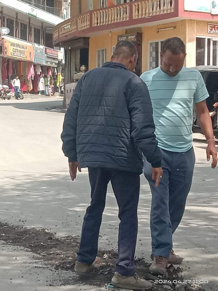 Department forgot to tar the road, taxi operators filled the potholes by pouring soil