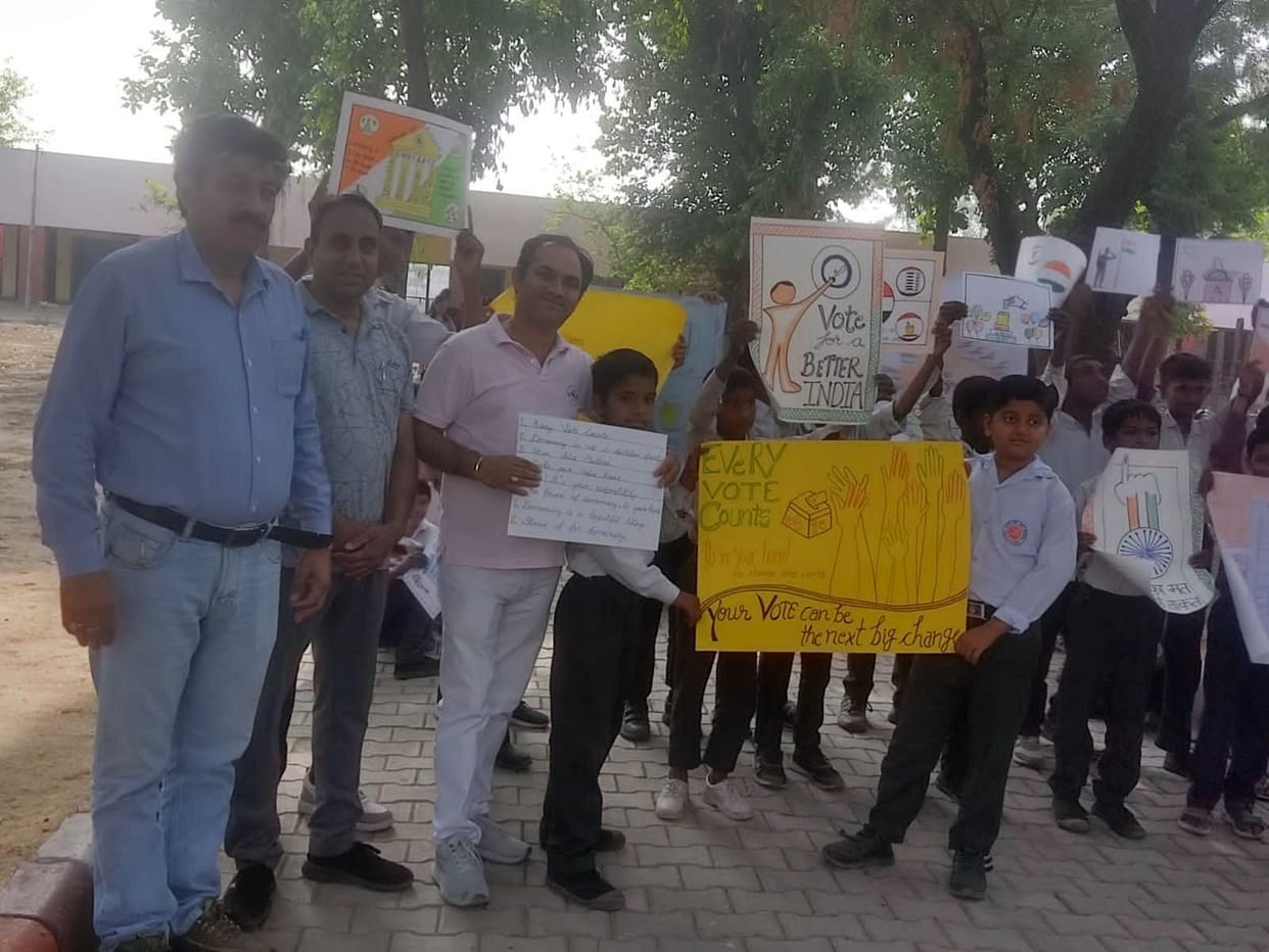 Students took out a rally and made villagers aware about voting.