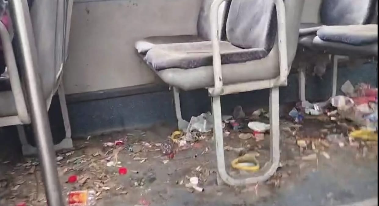 Two buses parked in the bus stand turned into a garbage dump.