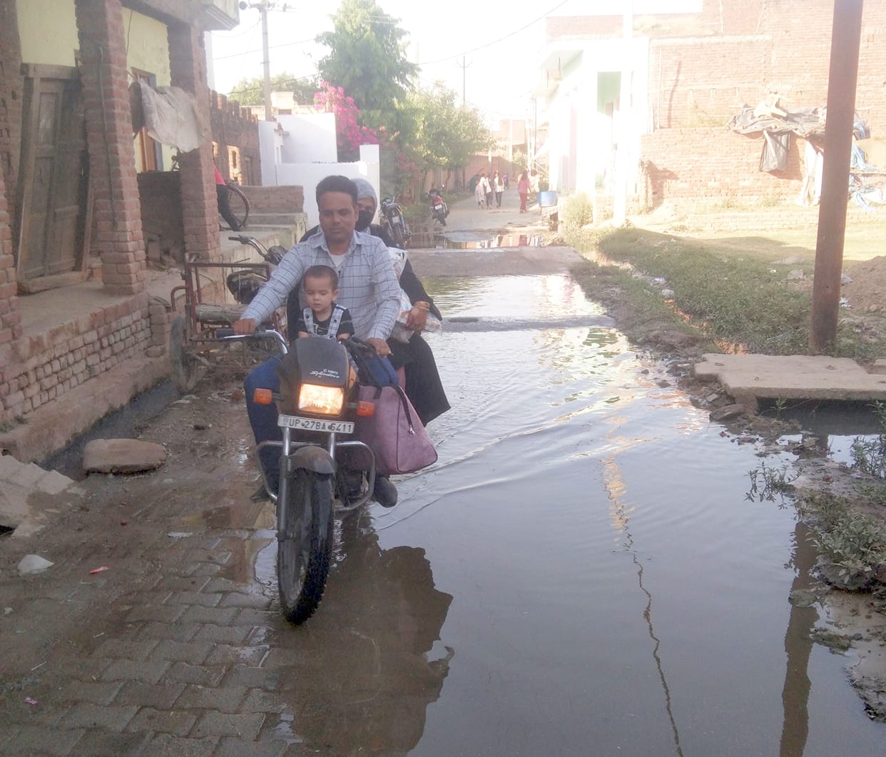 Drain closed without alternative arrangement, waterlogging on road