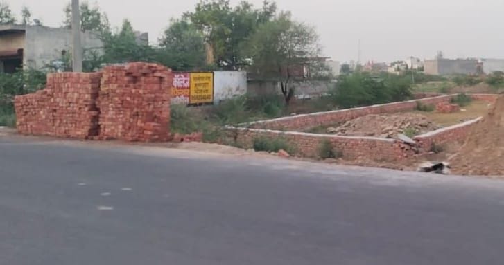 Whose responsibility is it to take action against illegal construction?