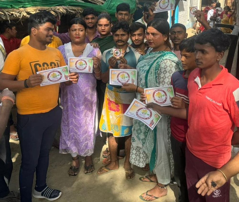Eunuchs taking pledge to vote by giving coin