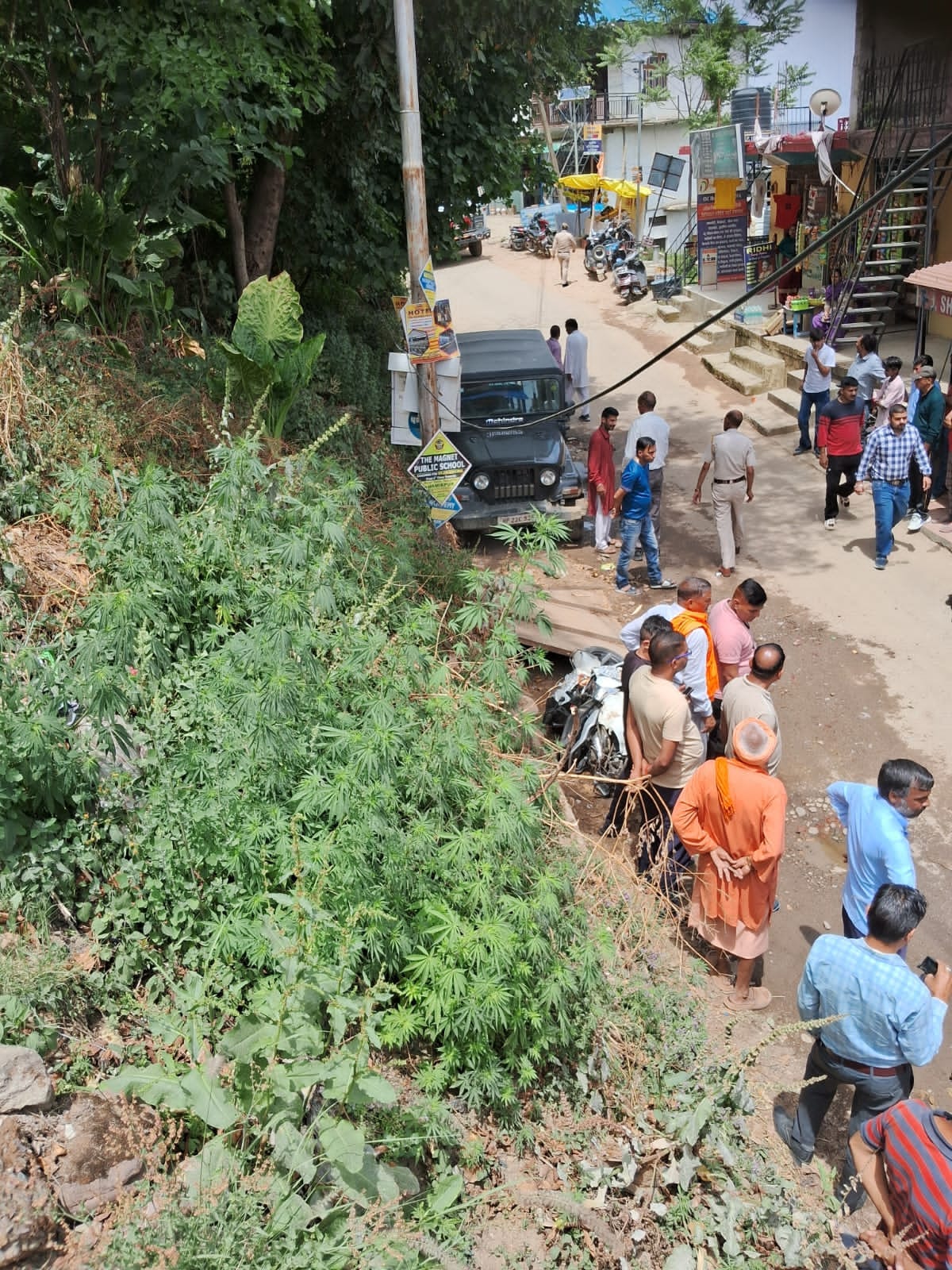A speeding Thar vehicle hit a scooter parked on the roadside.