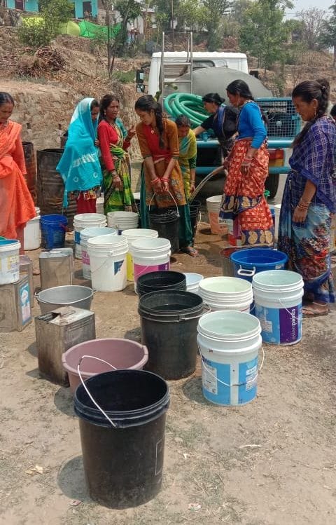 Taps dry, people filling water from tankers