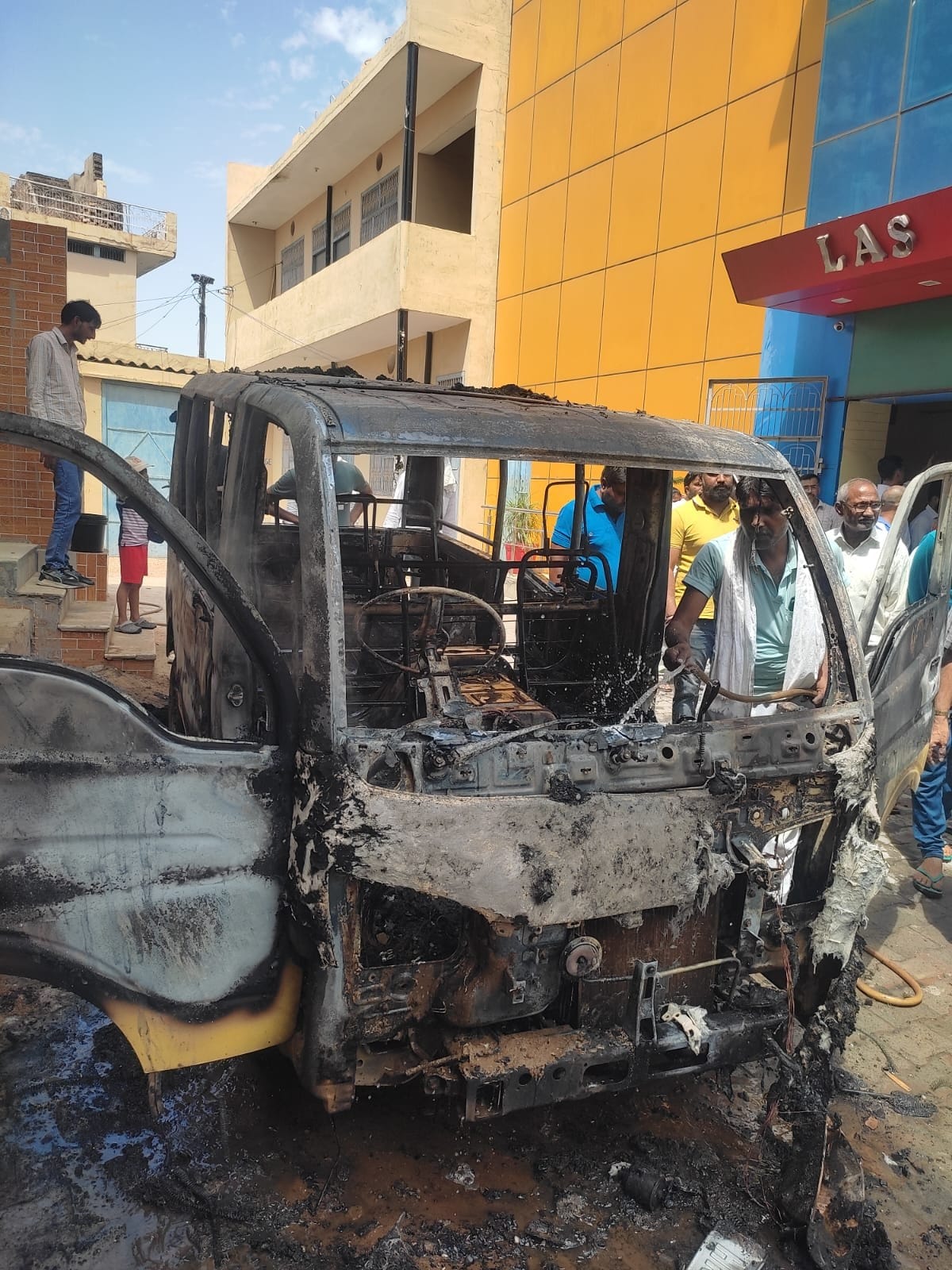 Fire broke out in a van parked outside the school due to short circuit