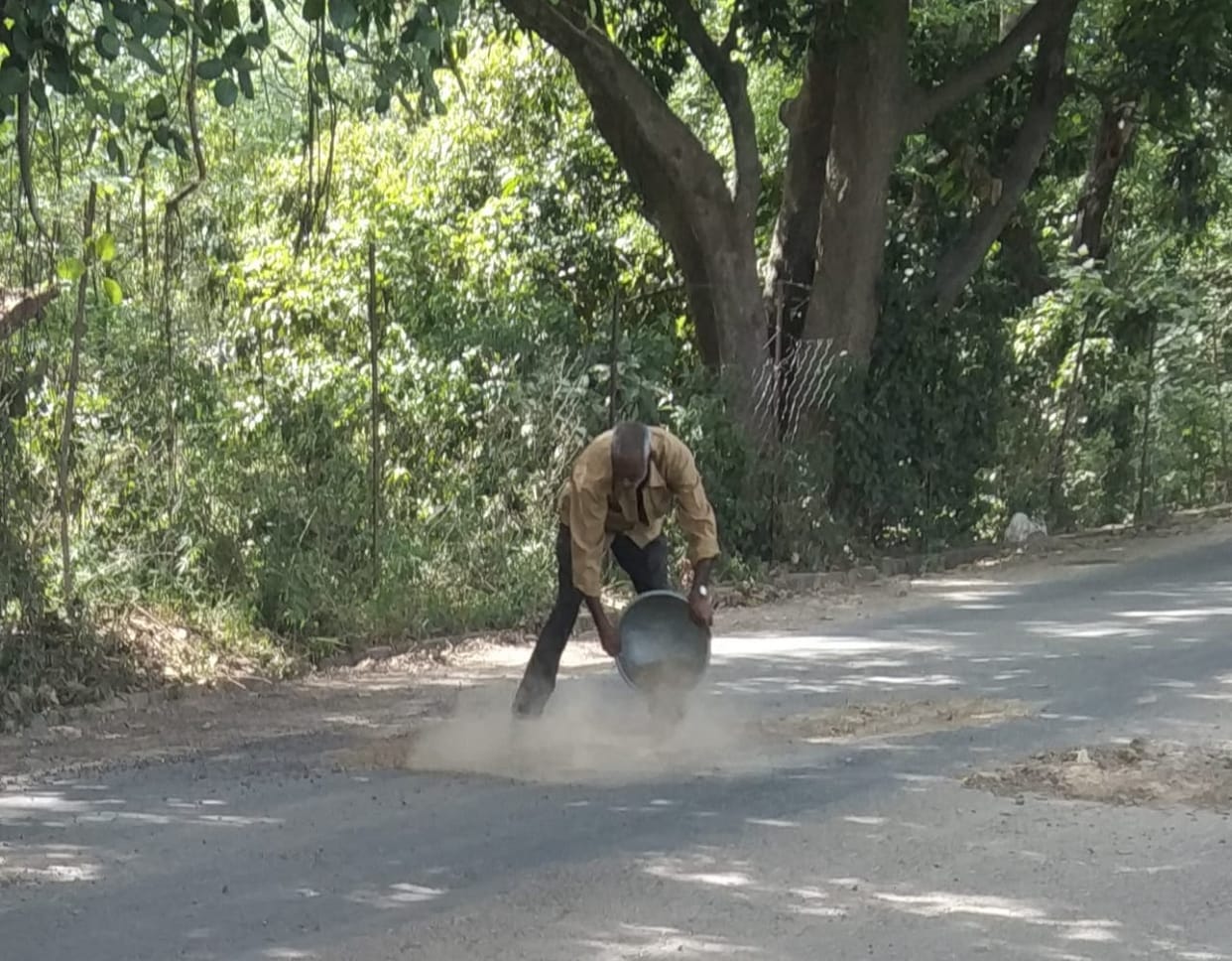 Replenishment is being done by pouring soil on damaged roads.