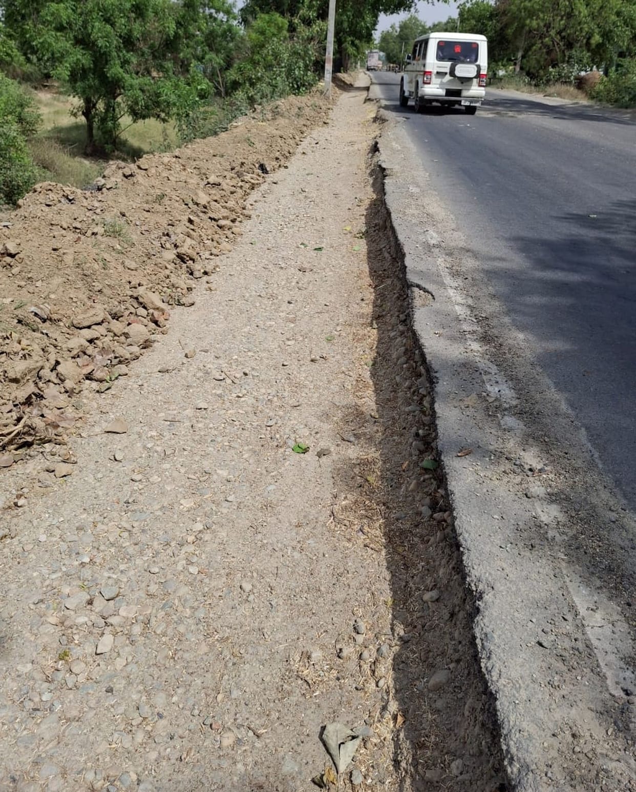 Road dug up, widening stalled...people falling and getting hurt