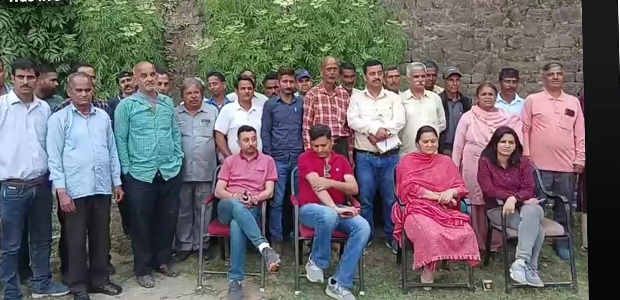 Employees angry over supervisor's suspension, sloganeering