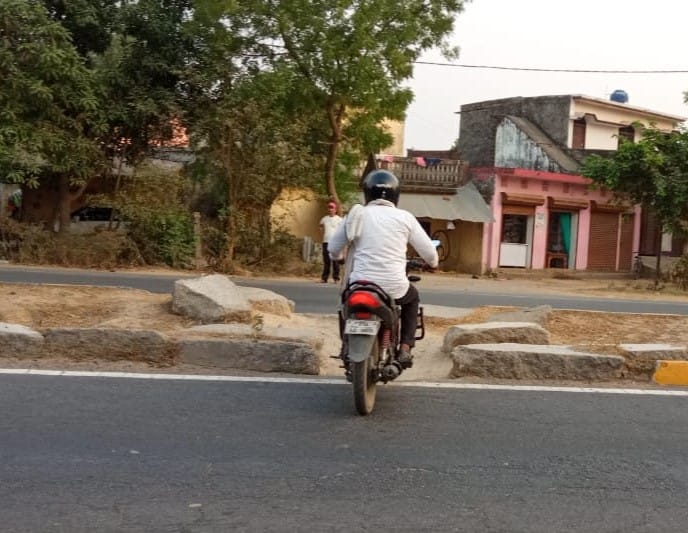 Crossing the road risking life