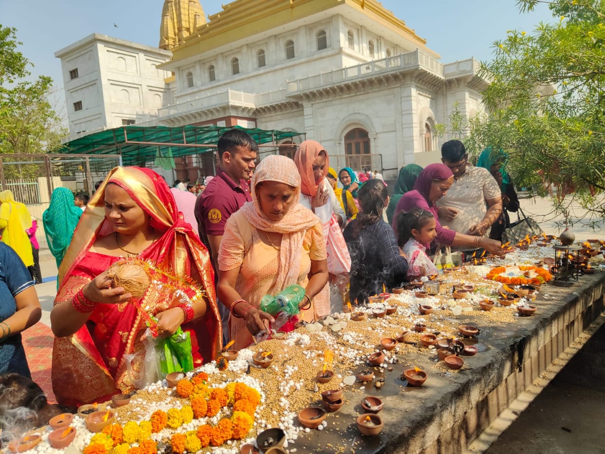 Crowd of devotees gathered on Ashtami, lamps of faith lit