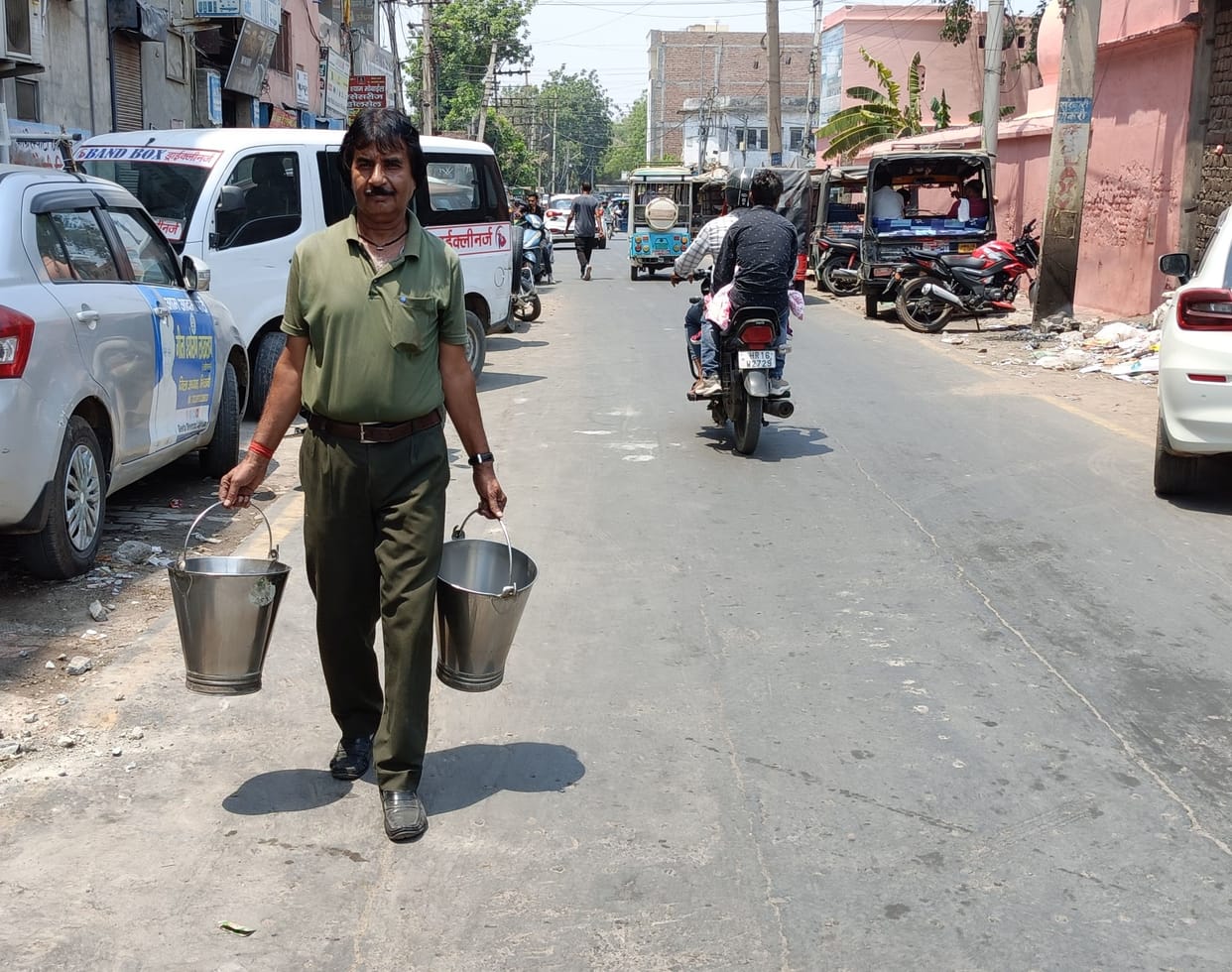 Some used water coolers and some filled buckets of water with hand pumps to quench their thirst throughout the day.