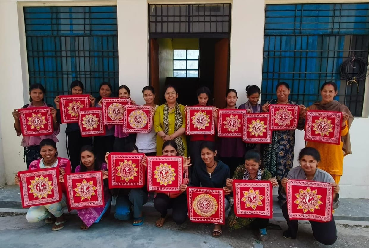 Women are being given training in Aipan