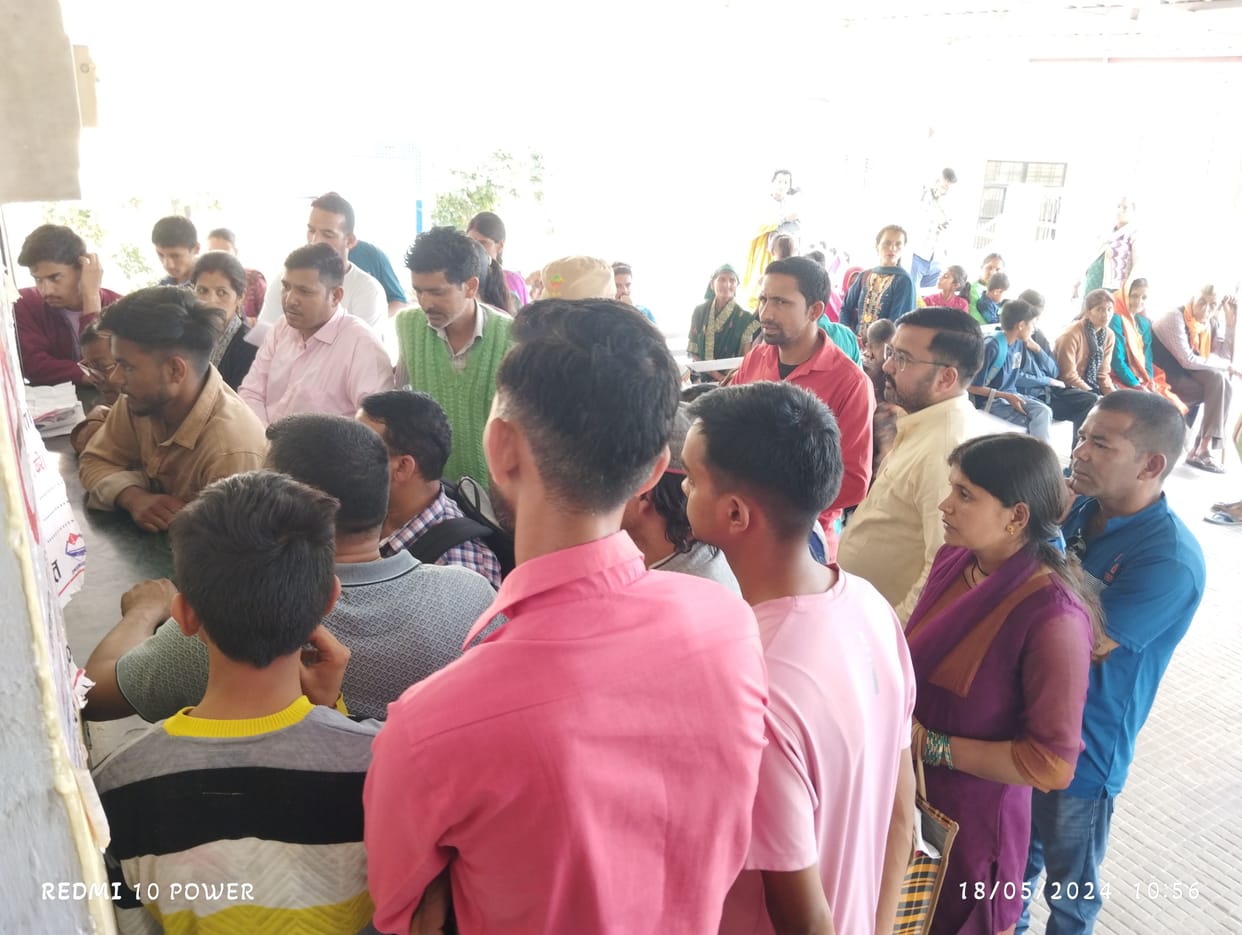 Crowd of patients in medicine distribution center