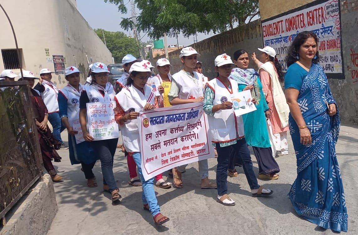 Volunteers organized a rally to make people aware about voting