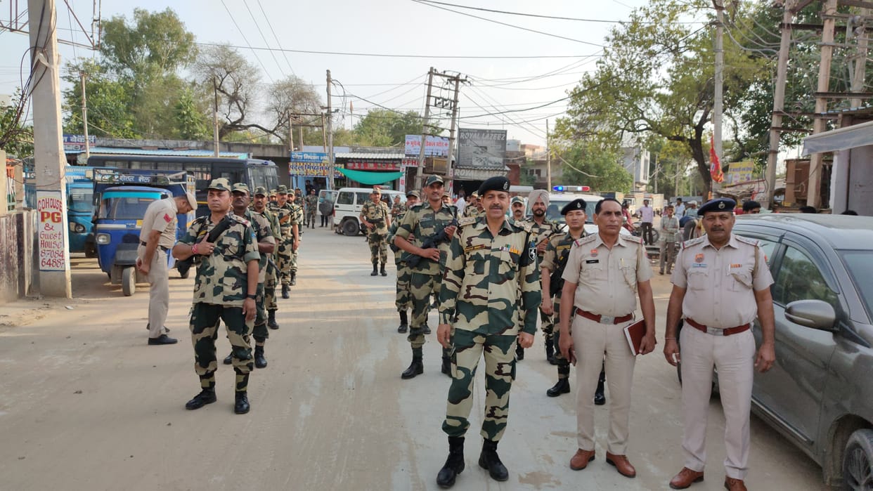Police and paramilitary forces conducted flag march