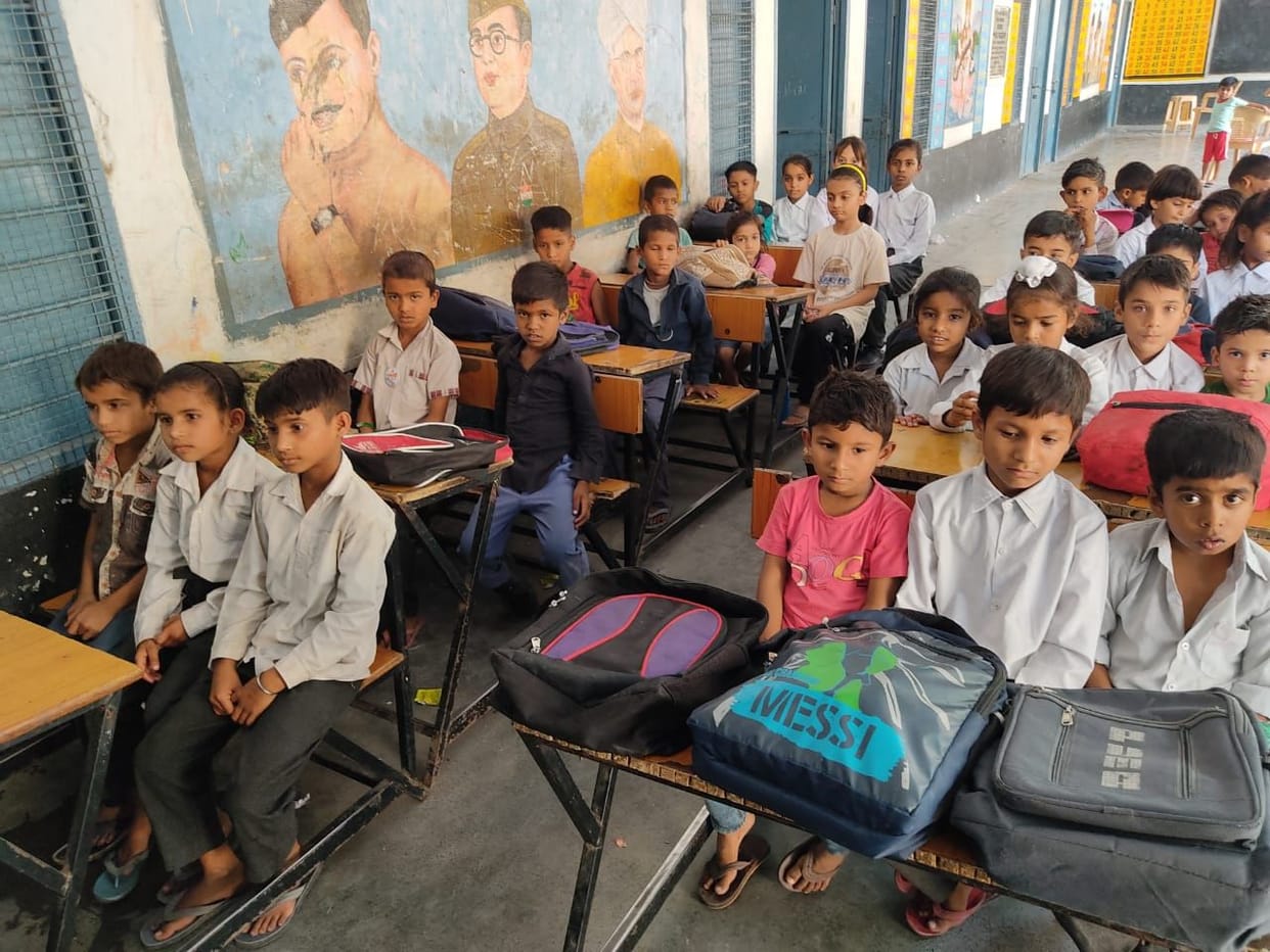 Second shift children studying in the scorching heat