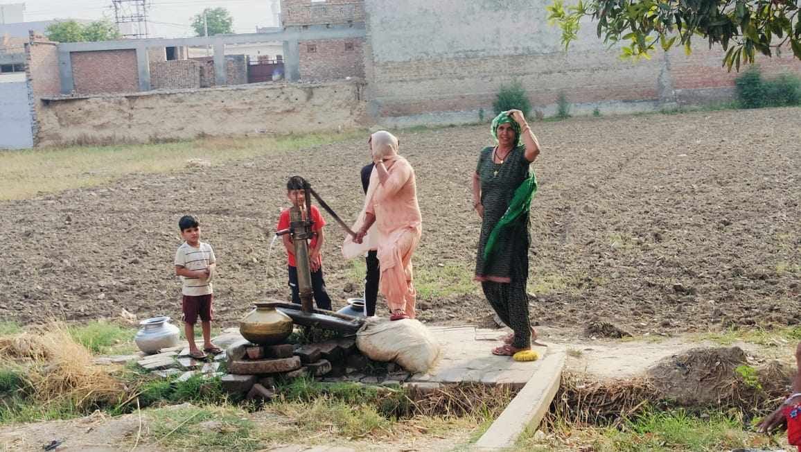 Children going to village from school to quench their thirst