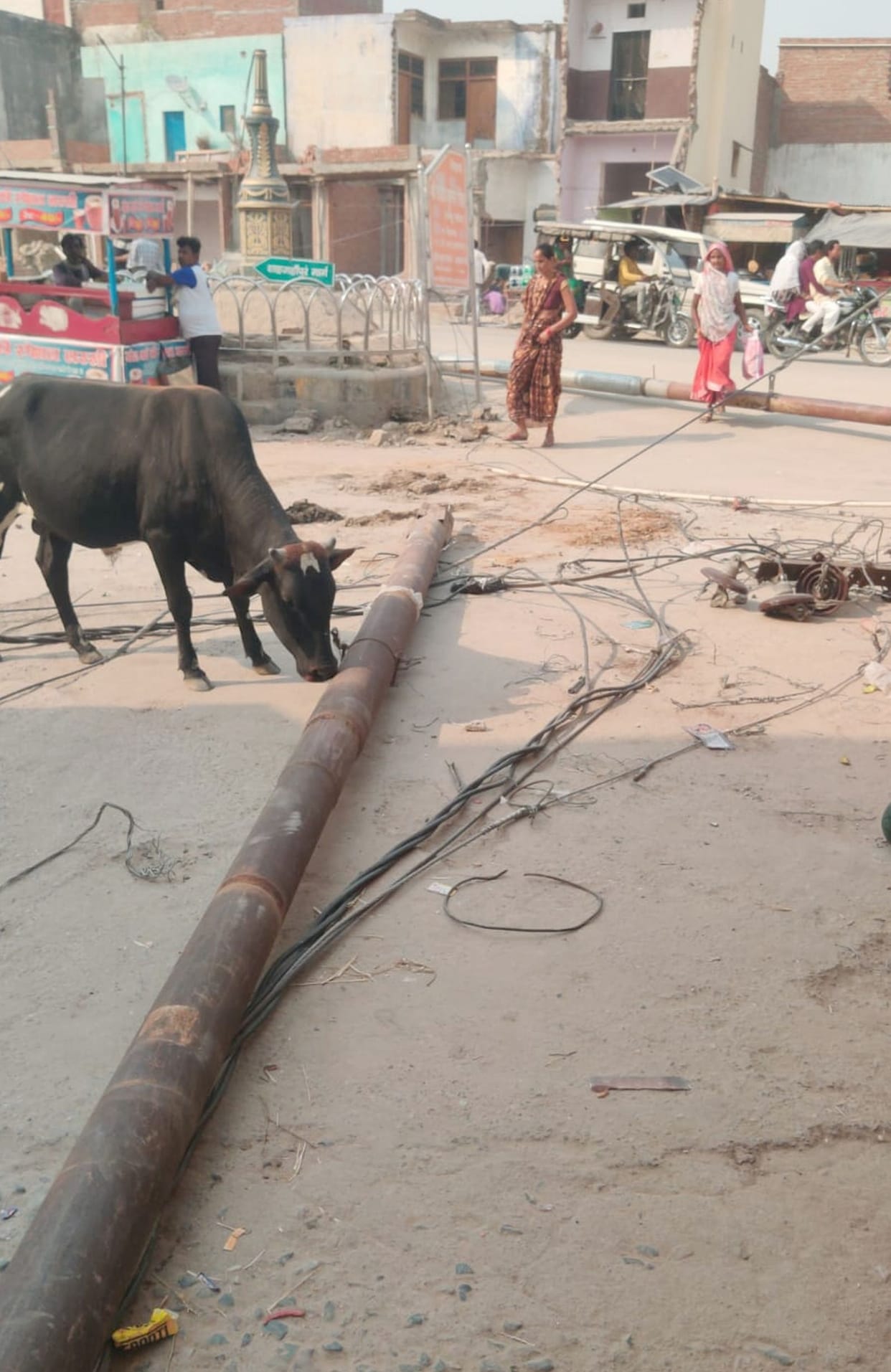 Two electric poles broken due to truck collision, supply to half the town disrupted