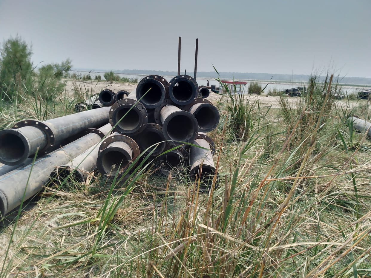 Pipes reached river bank for dosing channelization